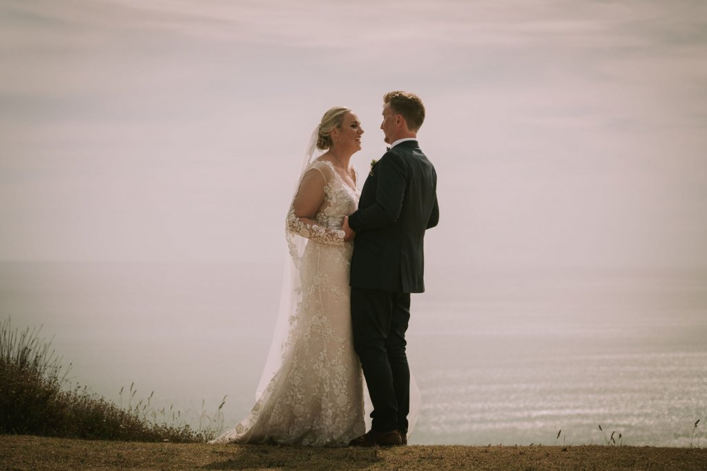 Real Bride Jamielle wearing her Custom Harriett Falvey Wedding Dress and Veil Made in New Zealand